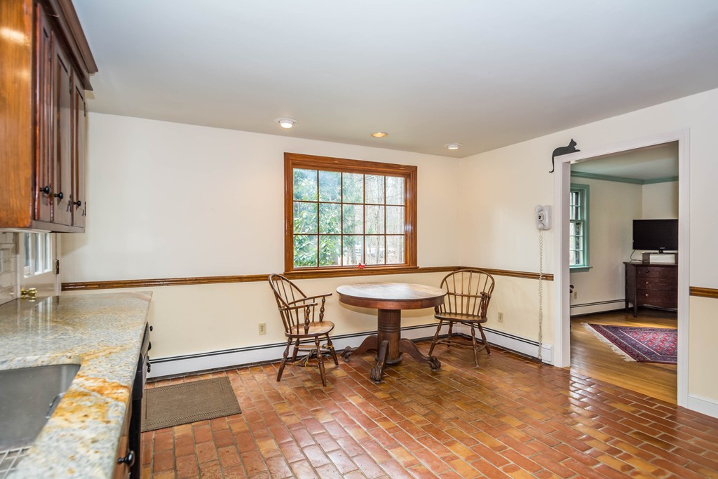 96 Middleton Road Boxford, MA 01921 - Photo 6 of 30 a view of a dining room with furniture and wooden floor