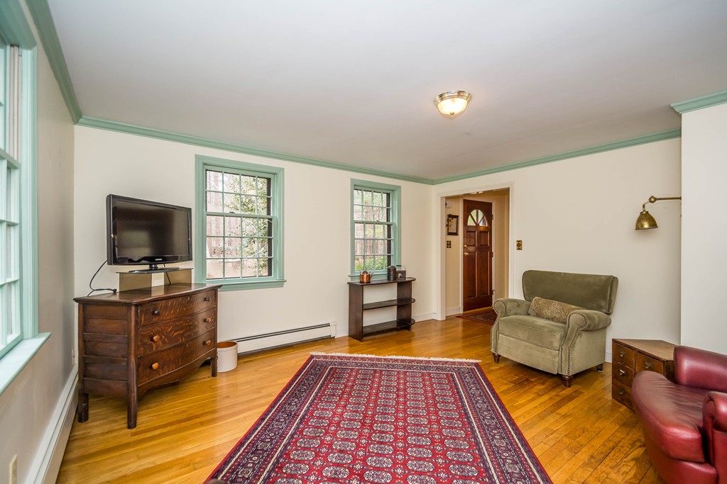 96 Middleton Road Boxford, MA 01921 - Photo 7 of 30 a living room with furniture and a flat screen tv