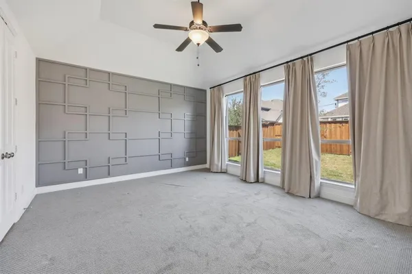 a bathroom with double sink and a mirror