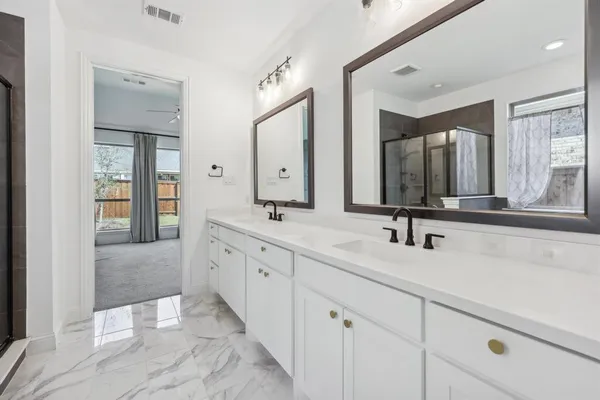 a bathroom with a sink a toilet and a bathtub