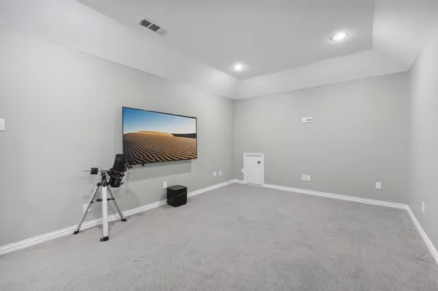 a view of room with gym equipment
