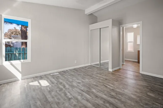 a view of a room that has a window in it