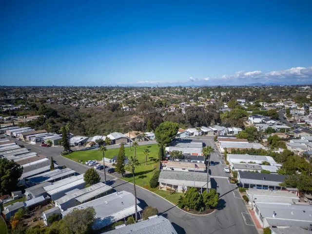 a large room with lots of chairs and a dining table
