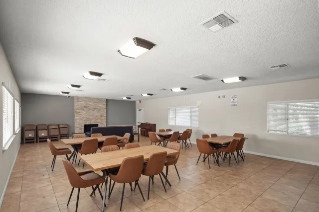 a sign broad in front of flowers