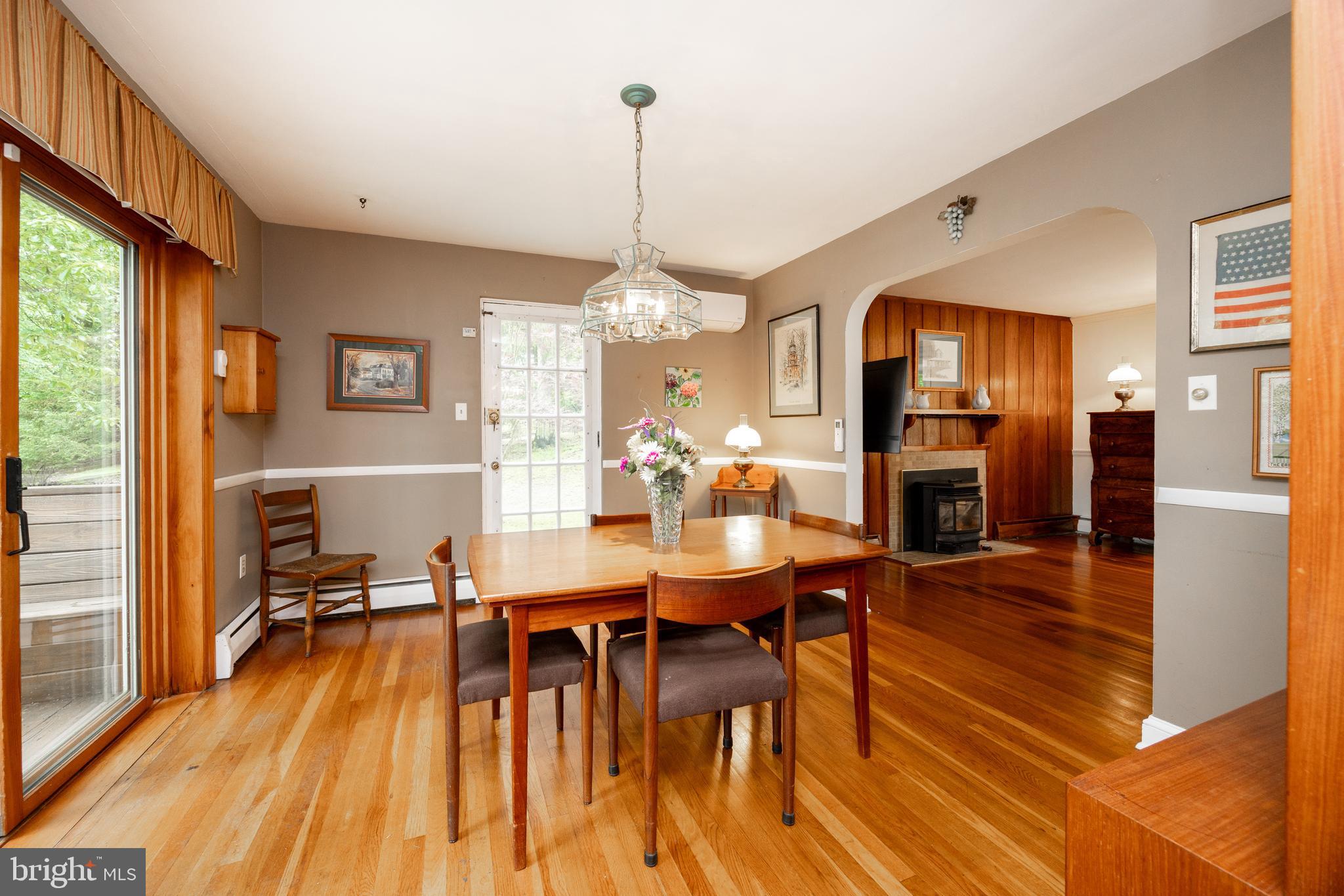 337 Greene Road Berwyn, PA 19312 - Photo 11 of 35 a view of a dining room with furniture window and wooden floor