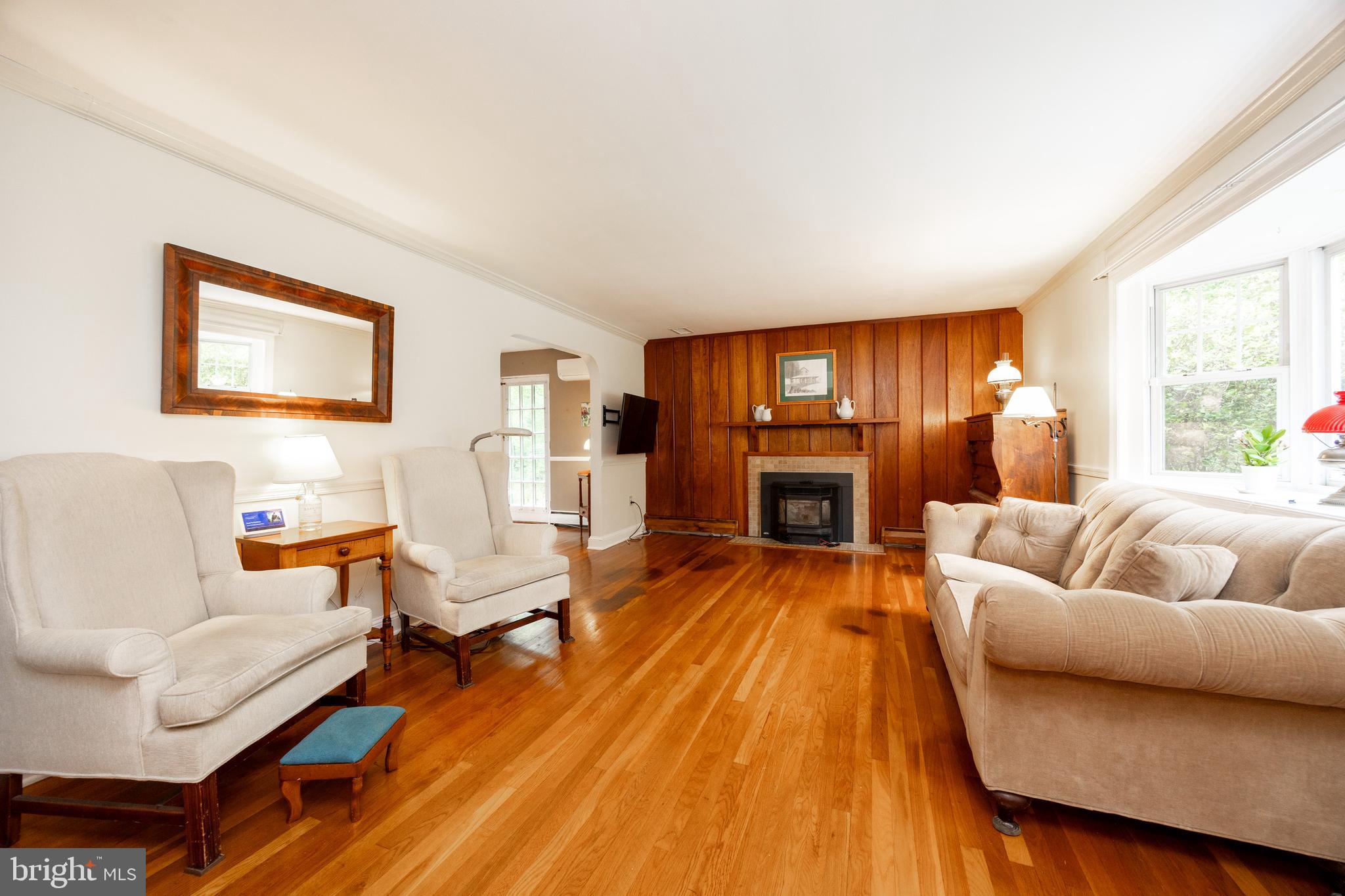 337 Greene Road Berwyn, PA 19312 - Photo 14 of 35 a living room with furniture and a fireplace