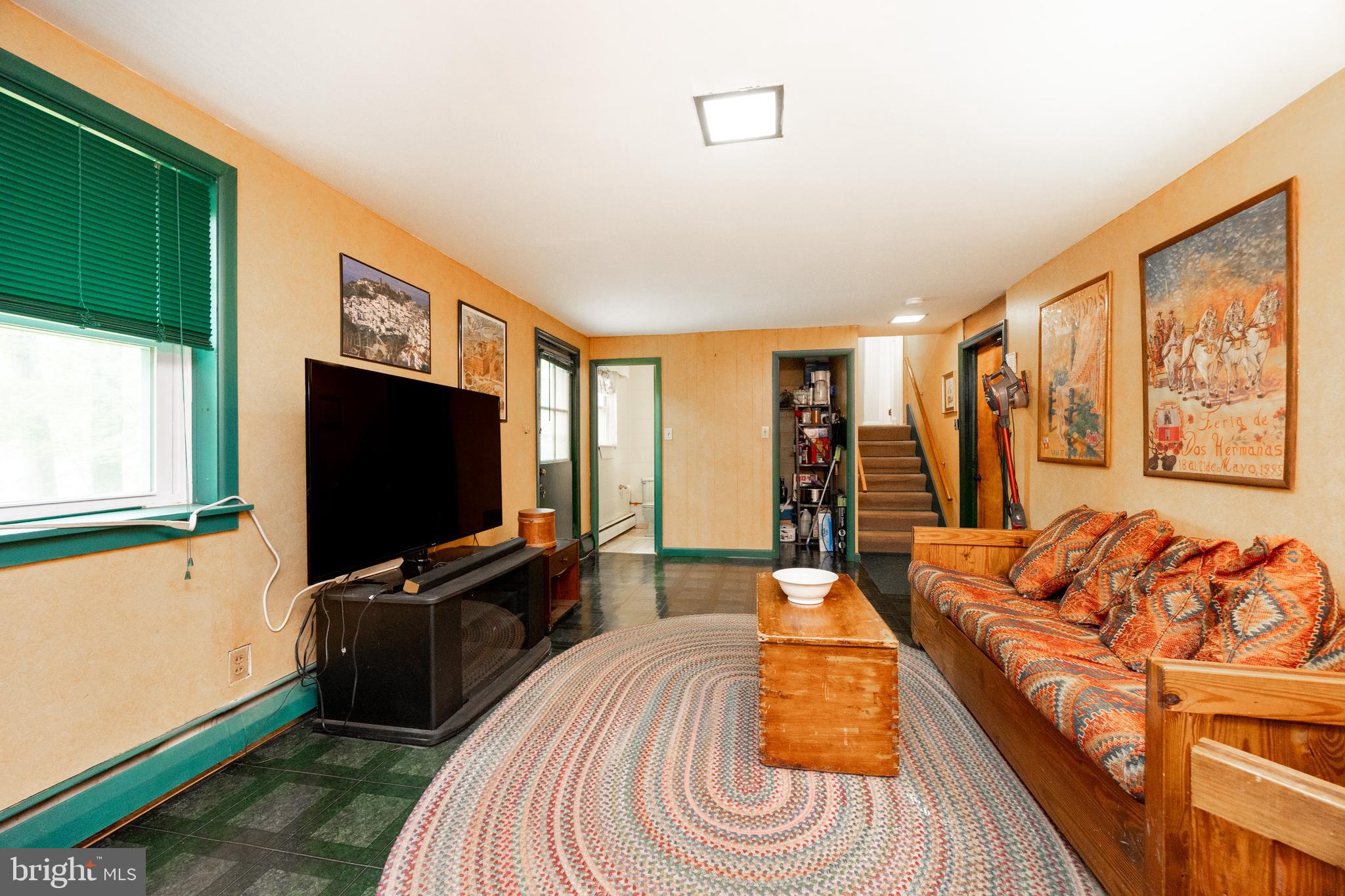 337 Greene Road Berwyn, PA 19312 - Photo 15 of 35 a living room with furniture and a flat screen tv