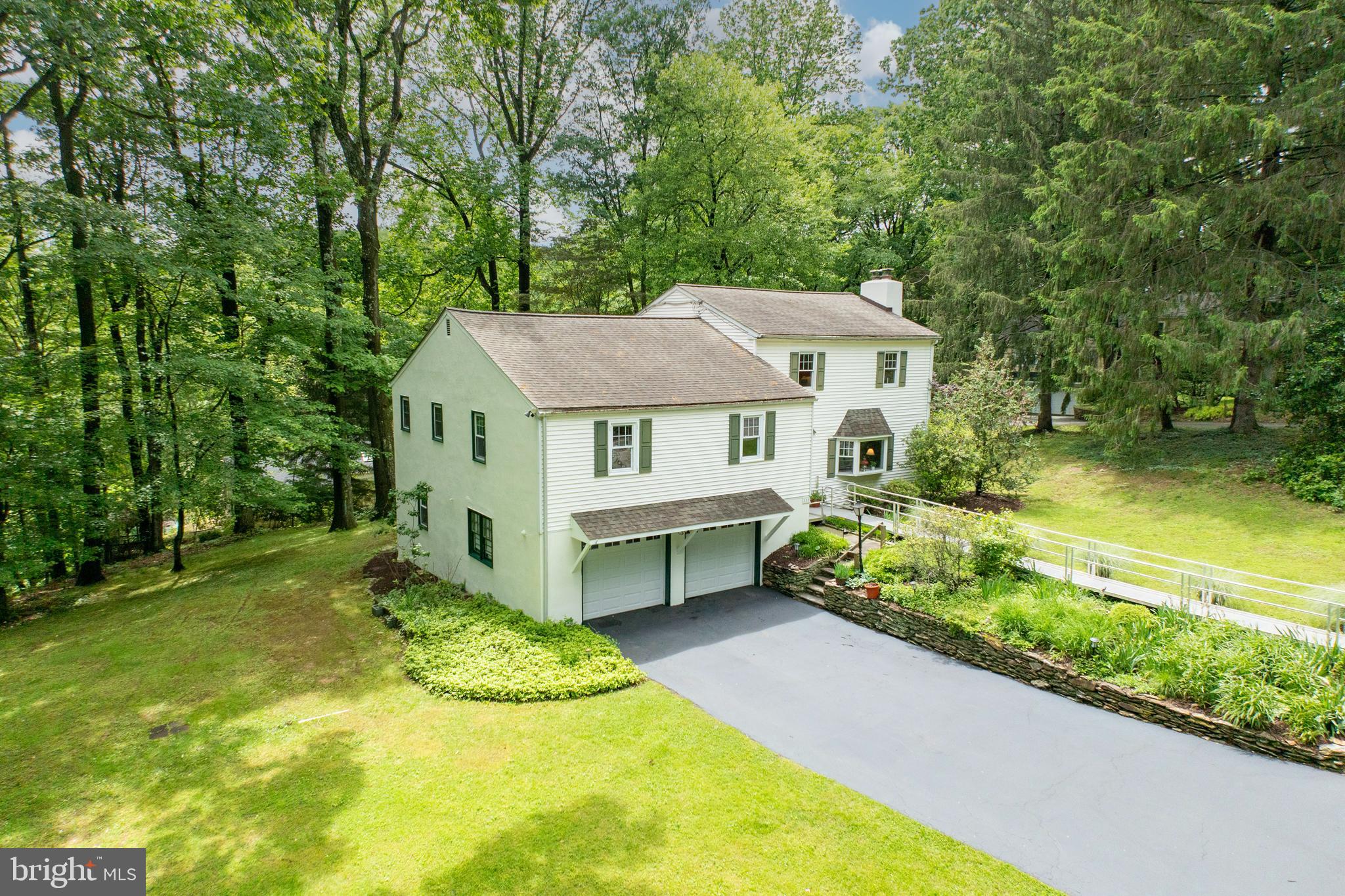 337 Greene Road Berwyn, PA 19312 - Photo 2 of 35 a aerial view of a house with a yard table and chairs