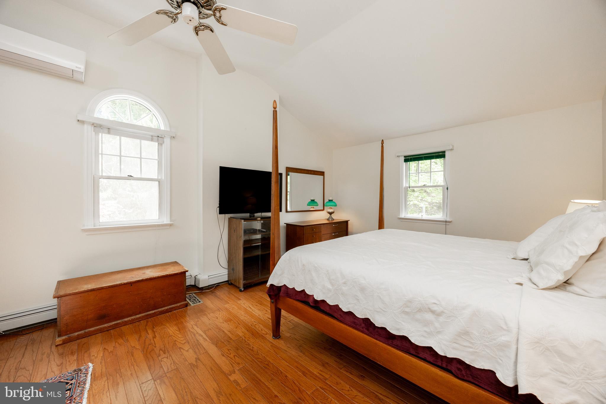 337 Greene Road Berwyn, PA 19312 - Photo 25 of 35 a bedroom with a bed flat screen tv and window
