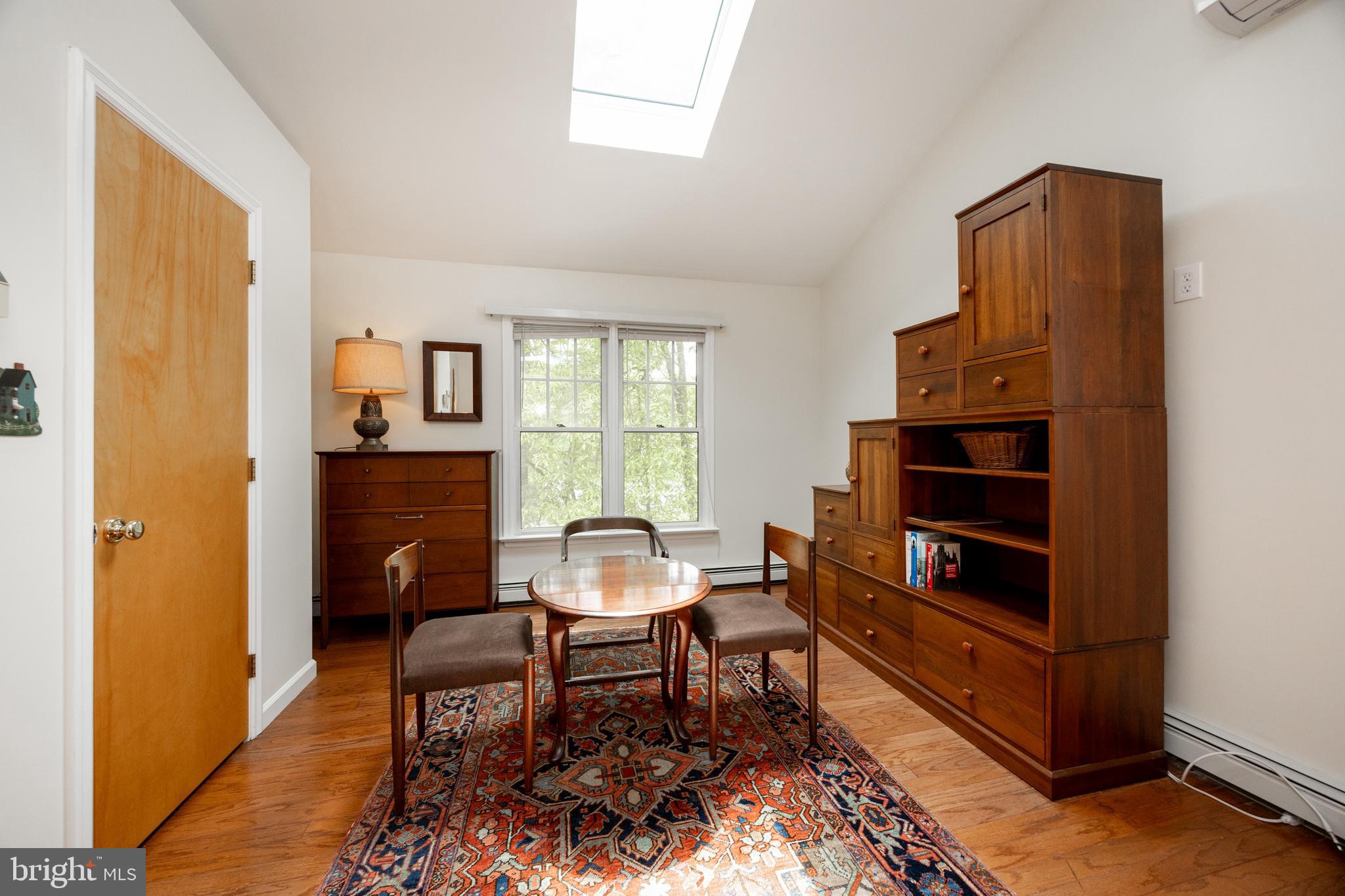 337 Greene Road Berwyn, PA 19312 - Photo 26 of 35 a living room with furniture a rug and a window