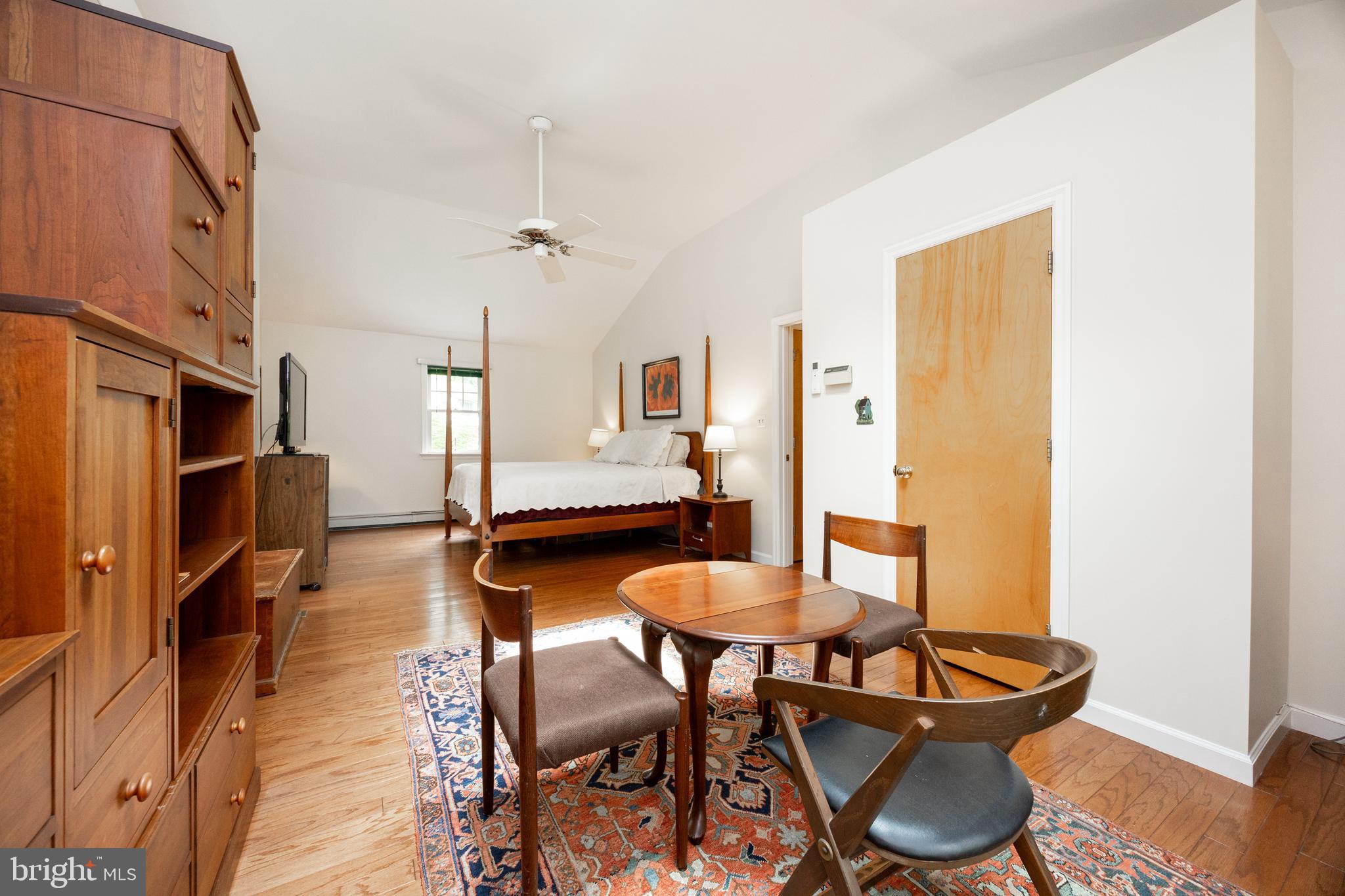 337 Greene Road Berwyn, PA 19312 - Photo 27 of 35 a dining room with furniture and wooden floor