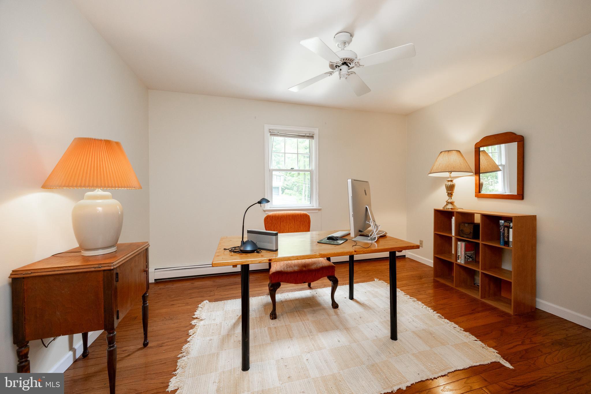 337 Greene Road Berwyn, PA 19312 - Photo 28 of 35 a view of a workspace with furniture and wooden floor