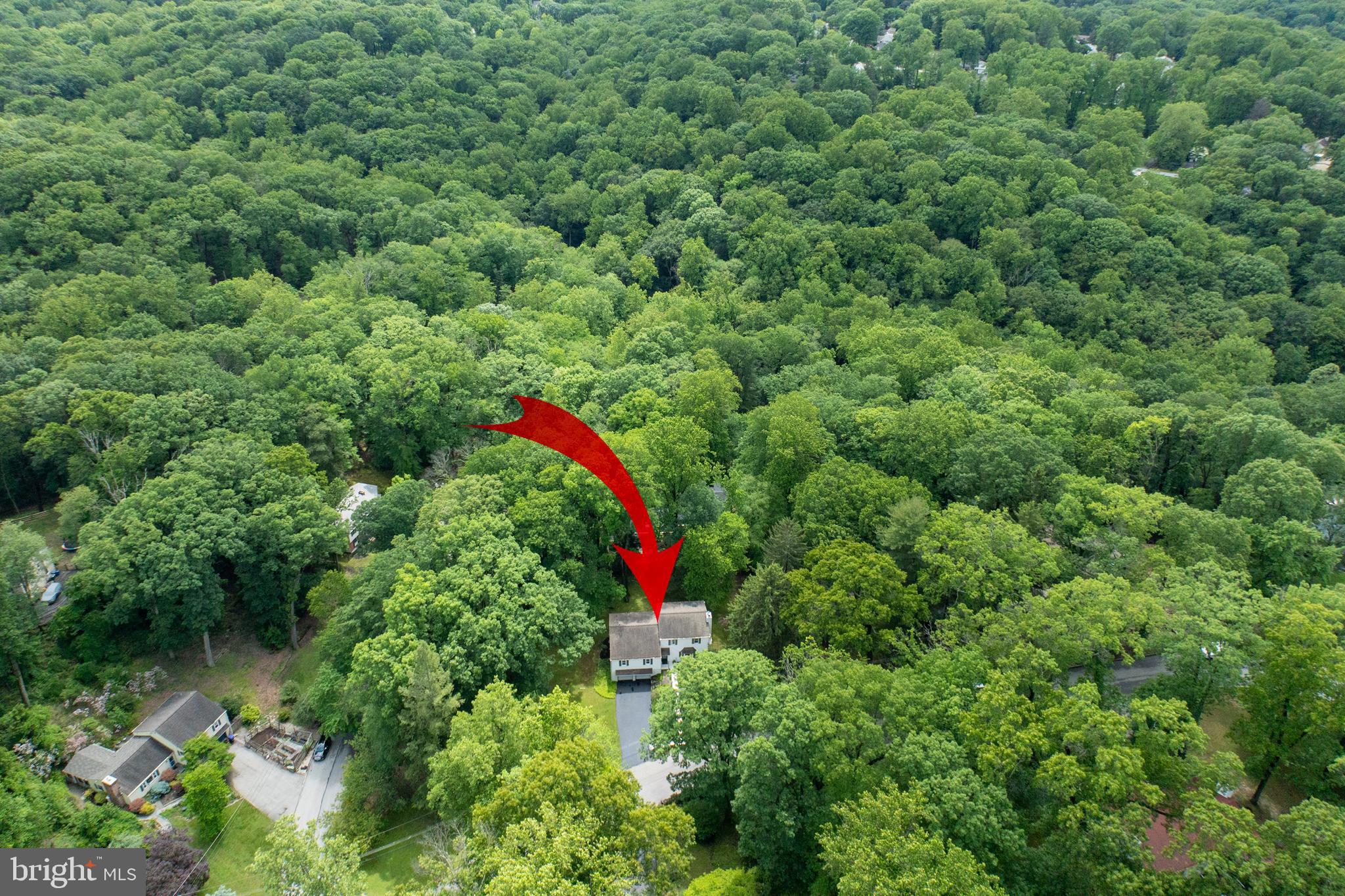 337 Greene Road Berwyn, PA 19312 - Photo 29 of 35 an aerial view of residential house with outdoor space and trees all around