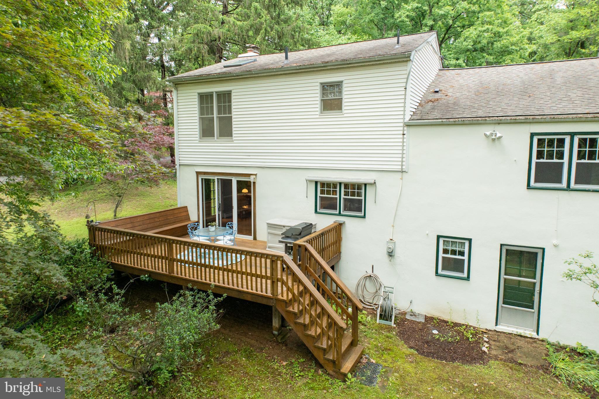 337 Greene Road Berwyn, PA 19312 - Photo 32 of 35 a view of a house with backyard and deck
