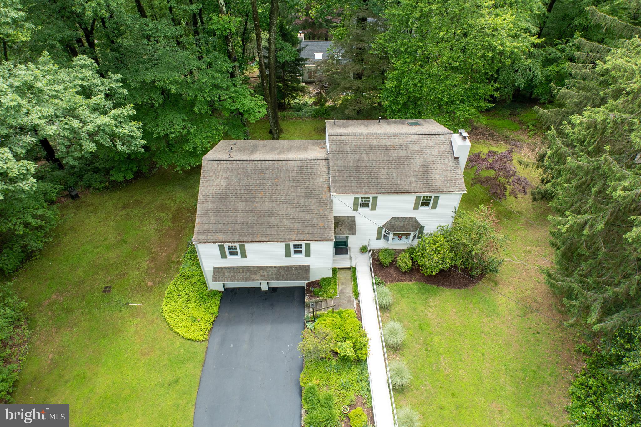 337 Greene Road Berwyn, PA 19312 - Photo 34 of 35 an aerial view of a house with swimming pool and garden