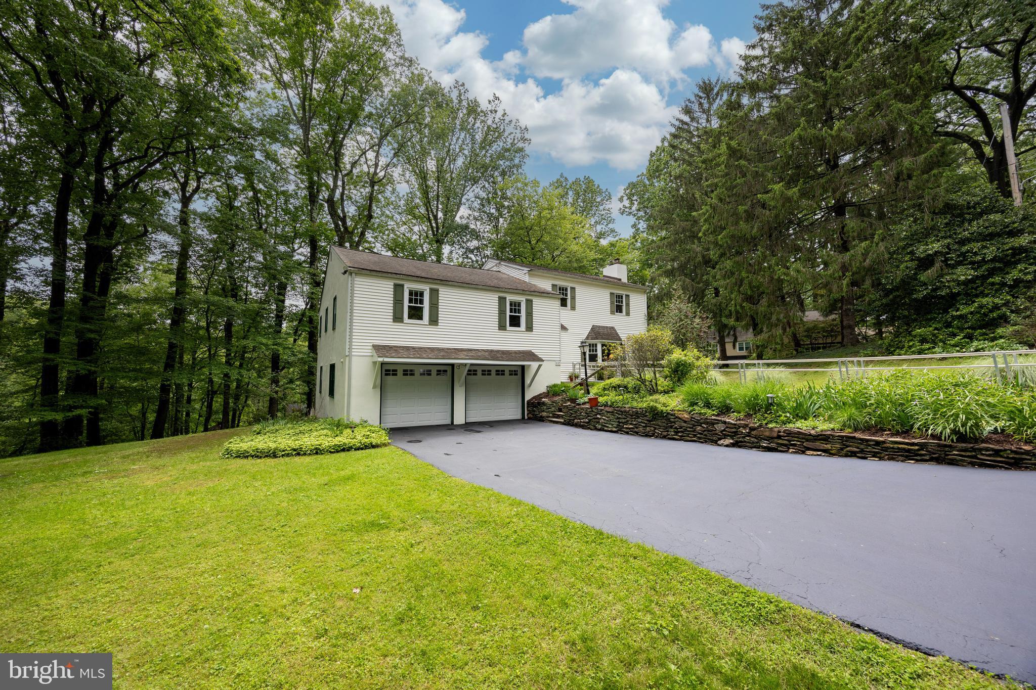 337 Greene Road Berwyn, PA 19312 - Photo 35 of 35 a view of a house with a yard and sitting area