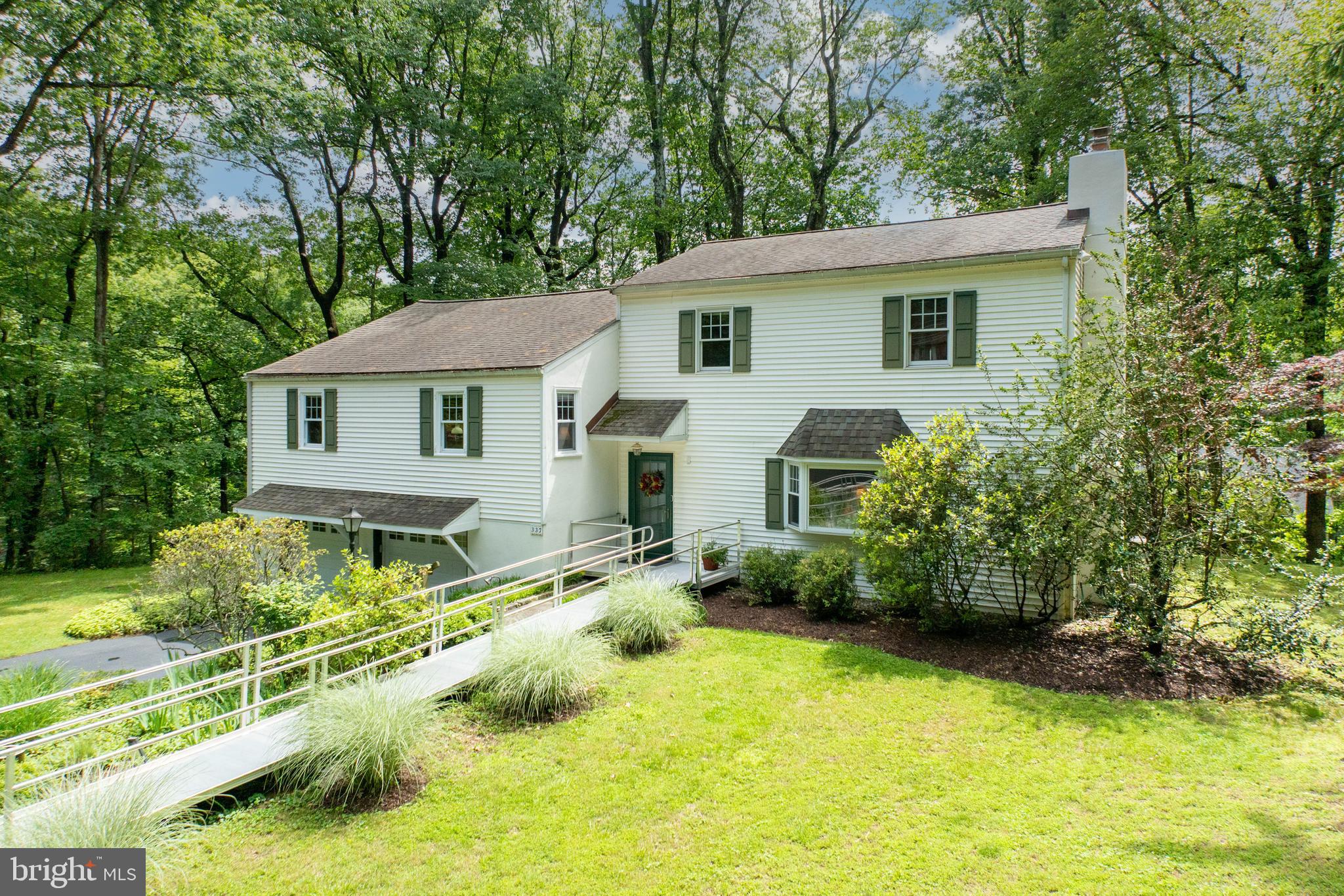 337 Greene Road Berwyn, PA 19312 - Photo 5 of 35 a view of backyard of house with green space