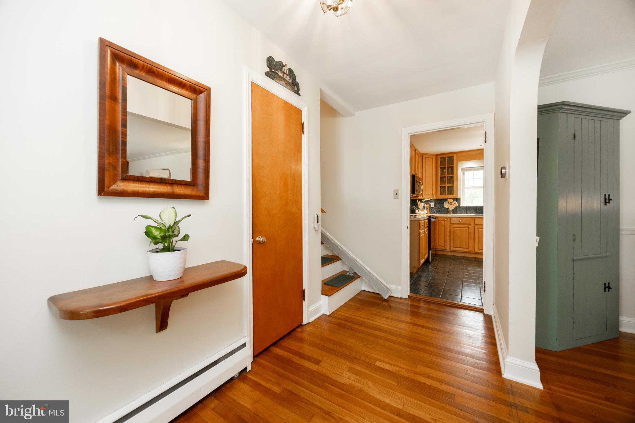 337 Greene Road Berwyn, PA 19312 - Photo 7 of 35 a hallway with wooden floor and furniture