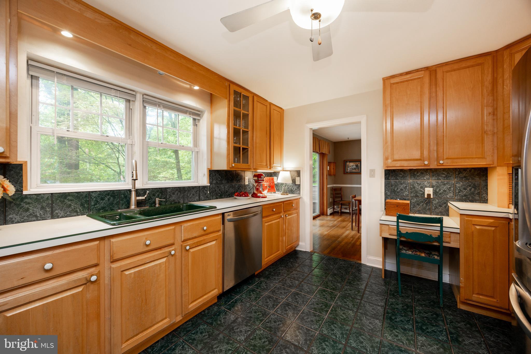 337 Greene Road Berwyn, PA 19312 - Photo 8 of 35 a kitchen with sink refrigerator and cabinets