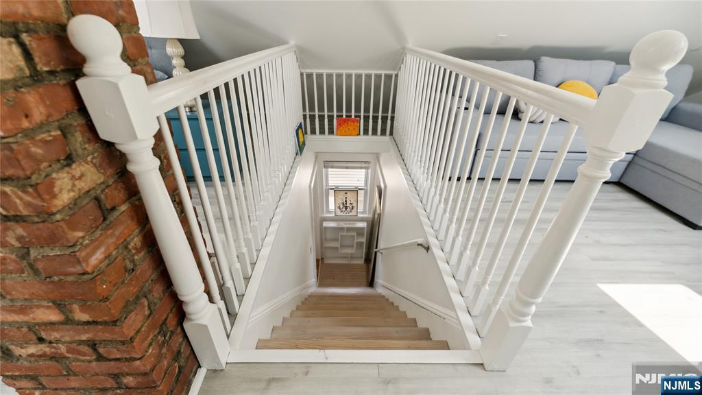 80 Union Avenue Little Ferry, NJ 07643 - Photo 12 of 35 a view of staircase with railing and white walls