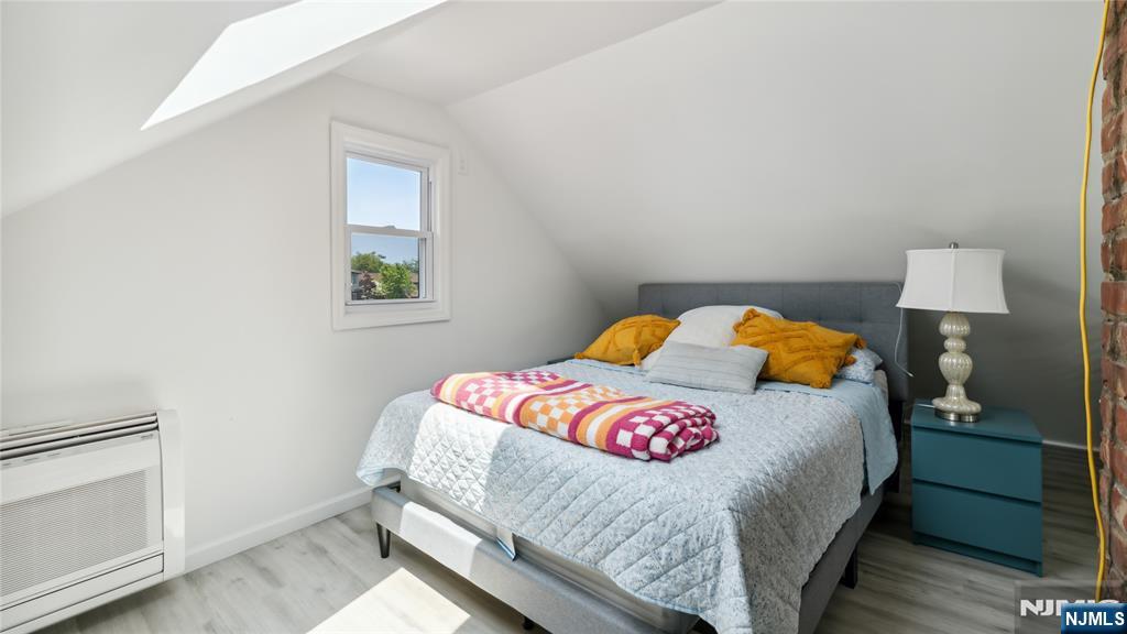 80 Union Avenue Little Ferry, NJ 07643 - Photo 14 of 35 a bedroom with a bed and a window