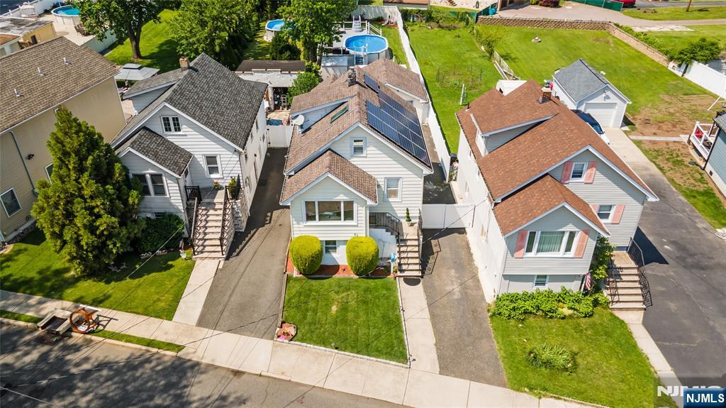 80 Union Avenue Little Ferry, NJ 07643 - Photo 33 of 35 an aerial view of residential house with outdoor space and swimming pool