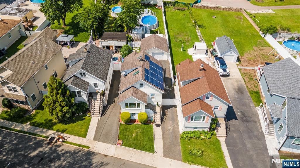80 Union Avenue Little Ferry, NJ 07643 - Photo 34 of 35 an aerial view of residential house with outdoor space and swimming pool