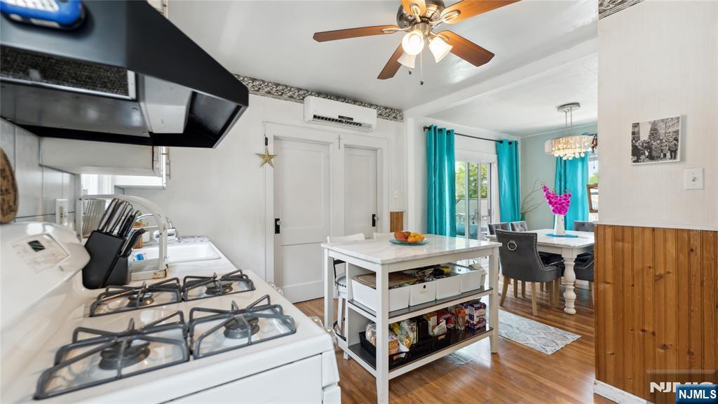 80 Union Avenue Little Ferry, NJ 07643 - Photo 4 of 35 a view of a dining room with furniture wooden floor and chandelier