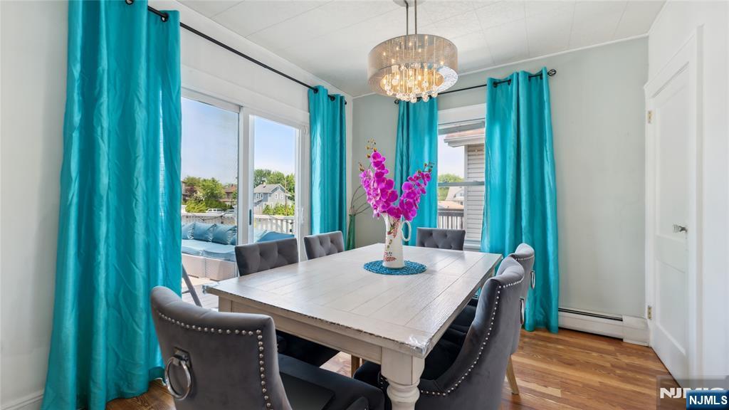 80 Union Avenue Little Ferry, NJ 07643 - Photo 5 of 35 a view of a dining room with furniture window and wooden floor