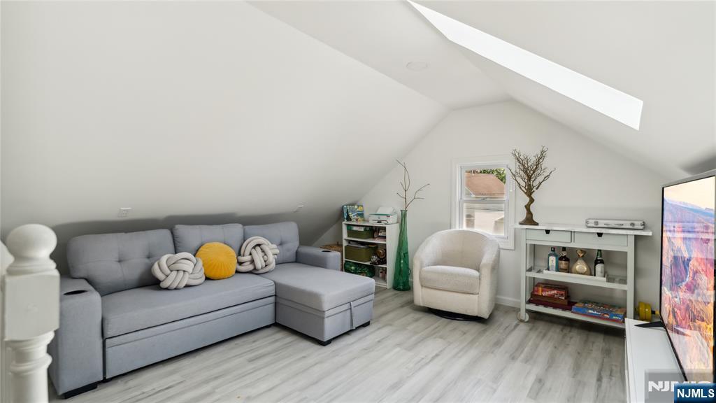 80 Union Avenue Little Ferry, NJ 07643 - Photo 10 of 35 a living room with furniture and wooden floor