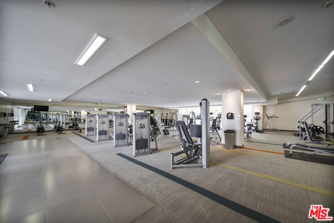 1234 Wilshire Boulevard, Unit 517 Los Angeles, CA 90017 - Photo 15 of 17 a view of a room with gym equipment