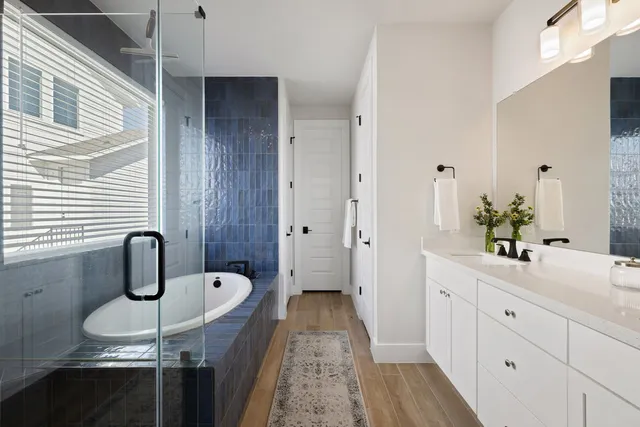 a bathroom with a sink and mirror