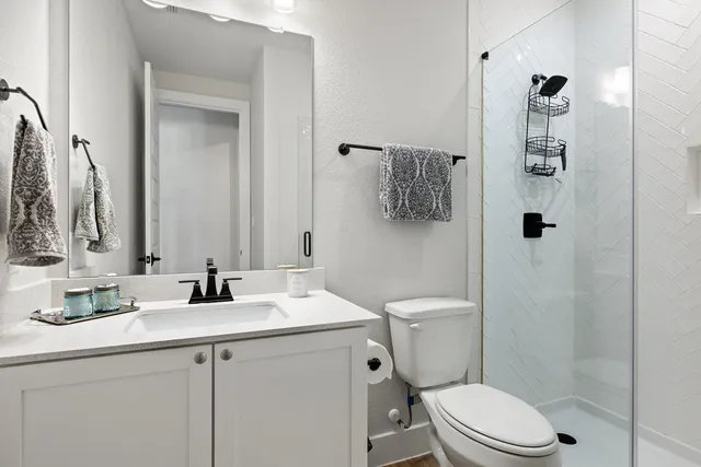 a view of a balcony with lake view and a potted plant