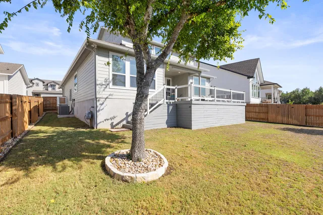 a view of road with large trees