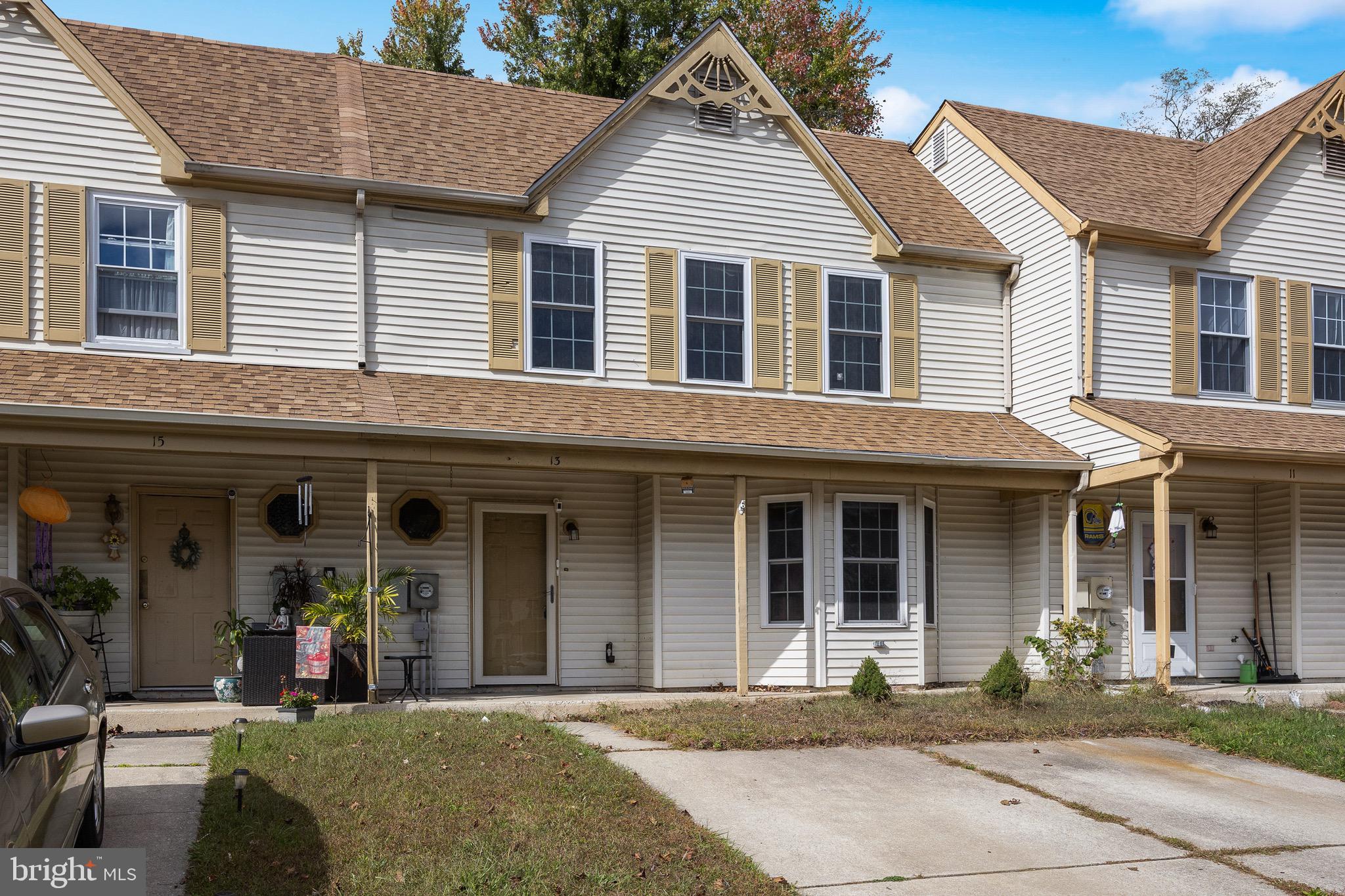 13 Summit Court Clementon, NJ 08021 - Photo 2 of 6 a front view of a house with a porch