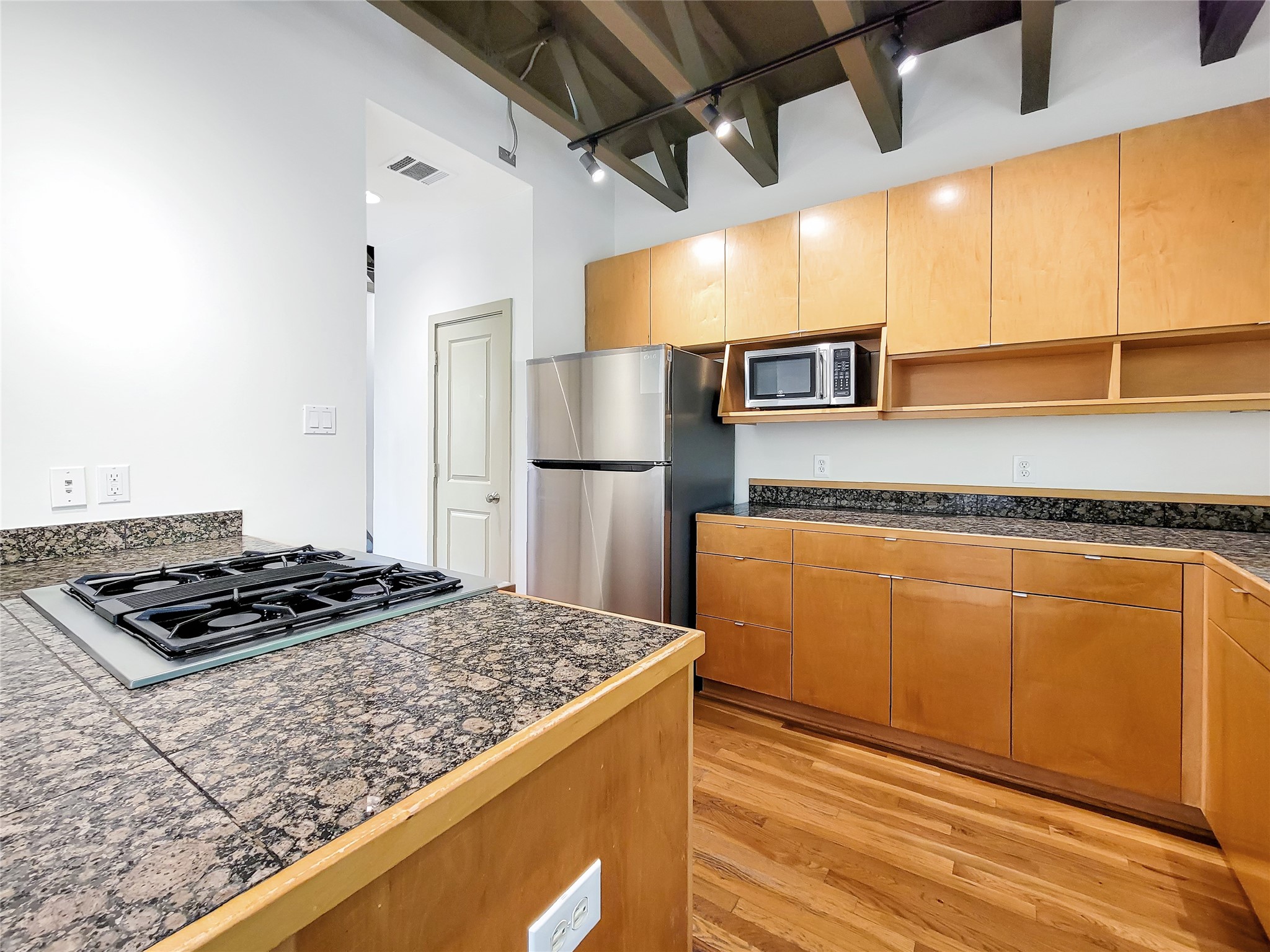 321 East 20th Street Houston, TX 77008 - Photo 23 of 36 The pantry in the background is right next to the refrigerator.
