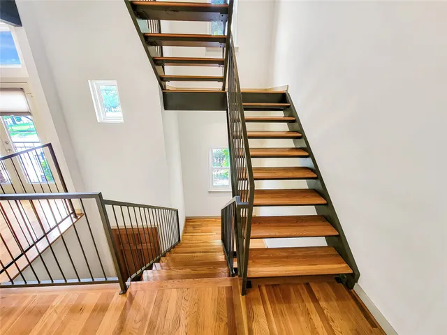 a view of entryway with wooden floor