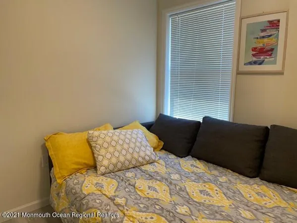 a bedroom with a bed in it