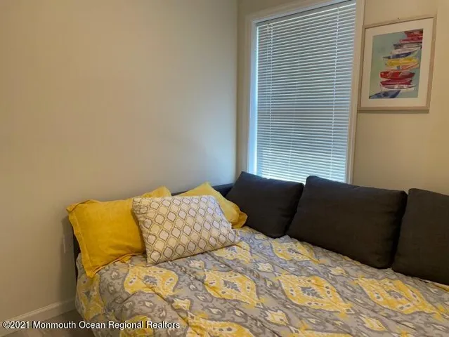 a bedroom with a bed in it