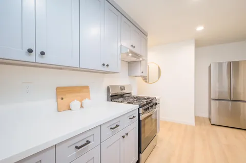 a bathroom with a toilet sink and bathtub