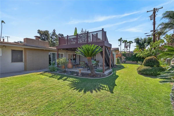 a house view with a garden space