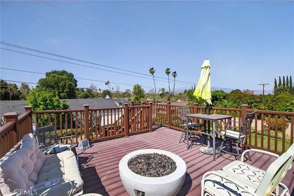 a view of a balcony with chairs