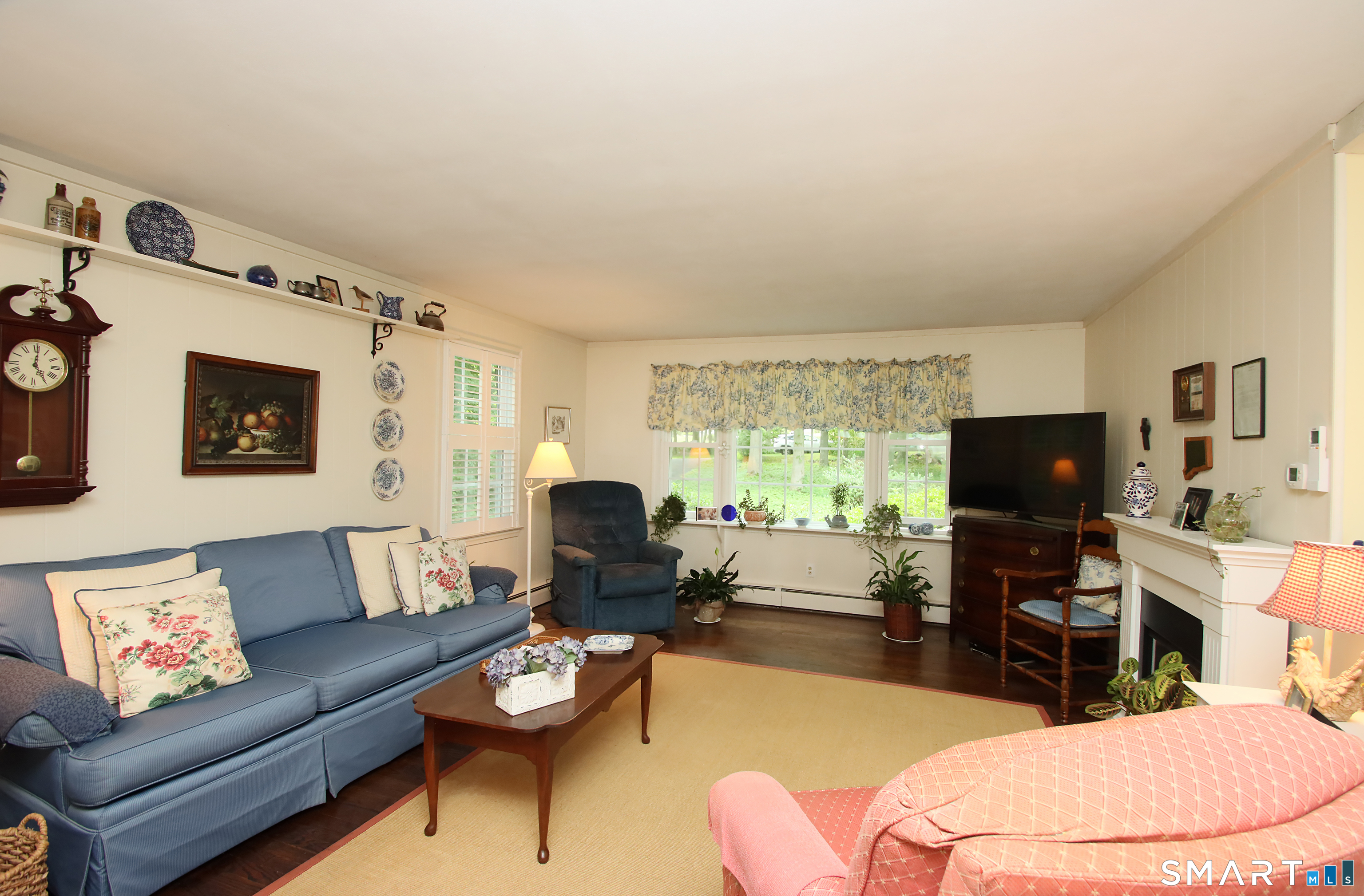49 Hammonassett Meadows Road Madison, CT 06443 - Photo 13 of 31 Family Room, there is no real fireplace in the family room. The one shown is an electric free standing "fireplace"