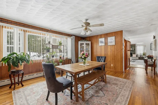 a view of a livingroom with furniture and window
