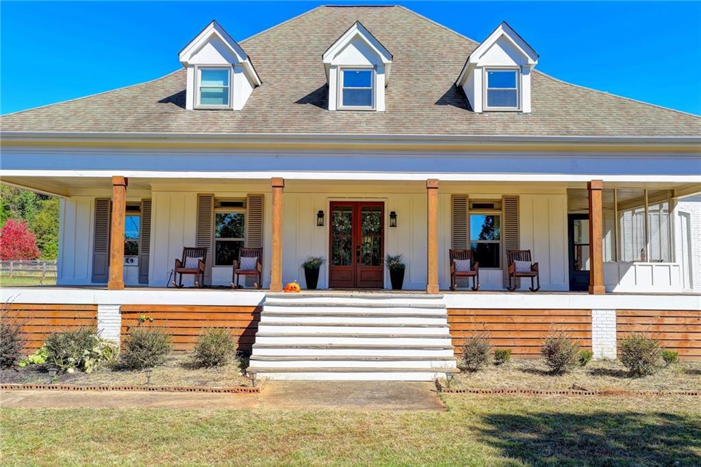 a view of a house with a swimming pool
