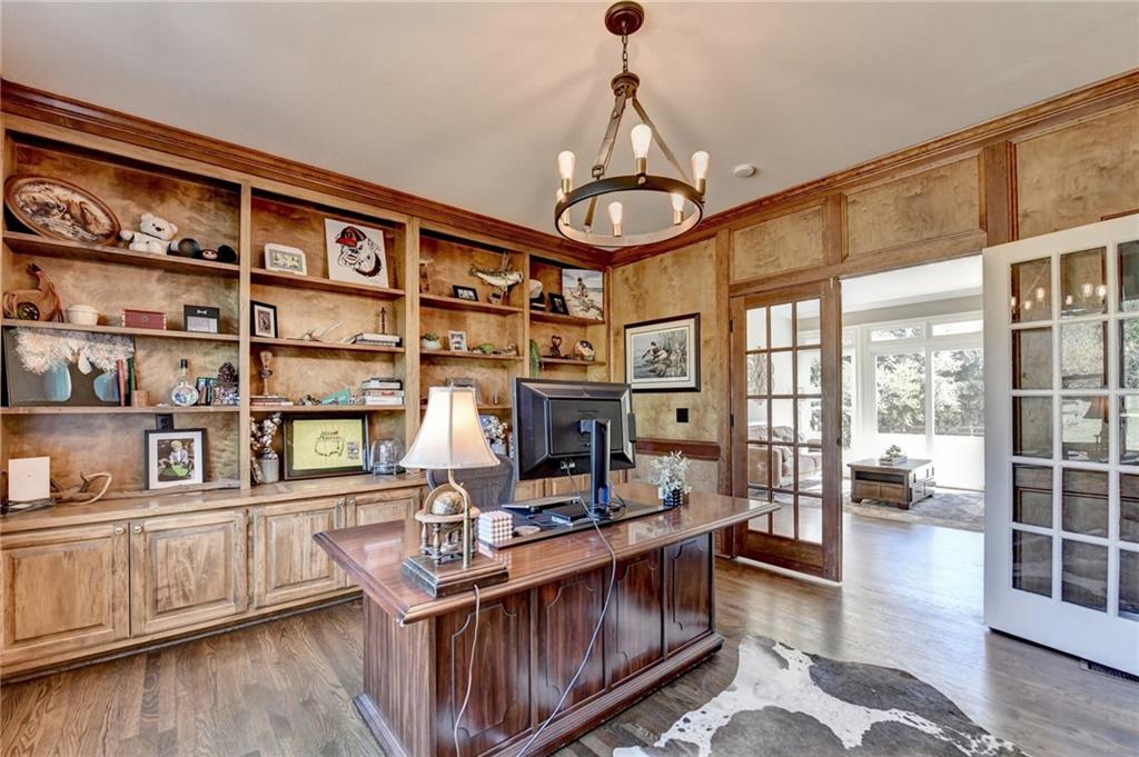 2853 Brookside Drive Monroe, GA 30656 - Photo 32 of 76 a view of a dining room with furniture window and wooden floor