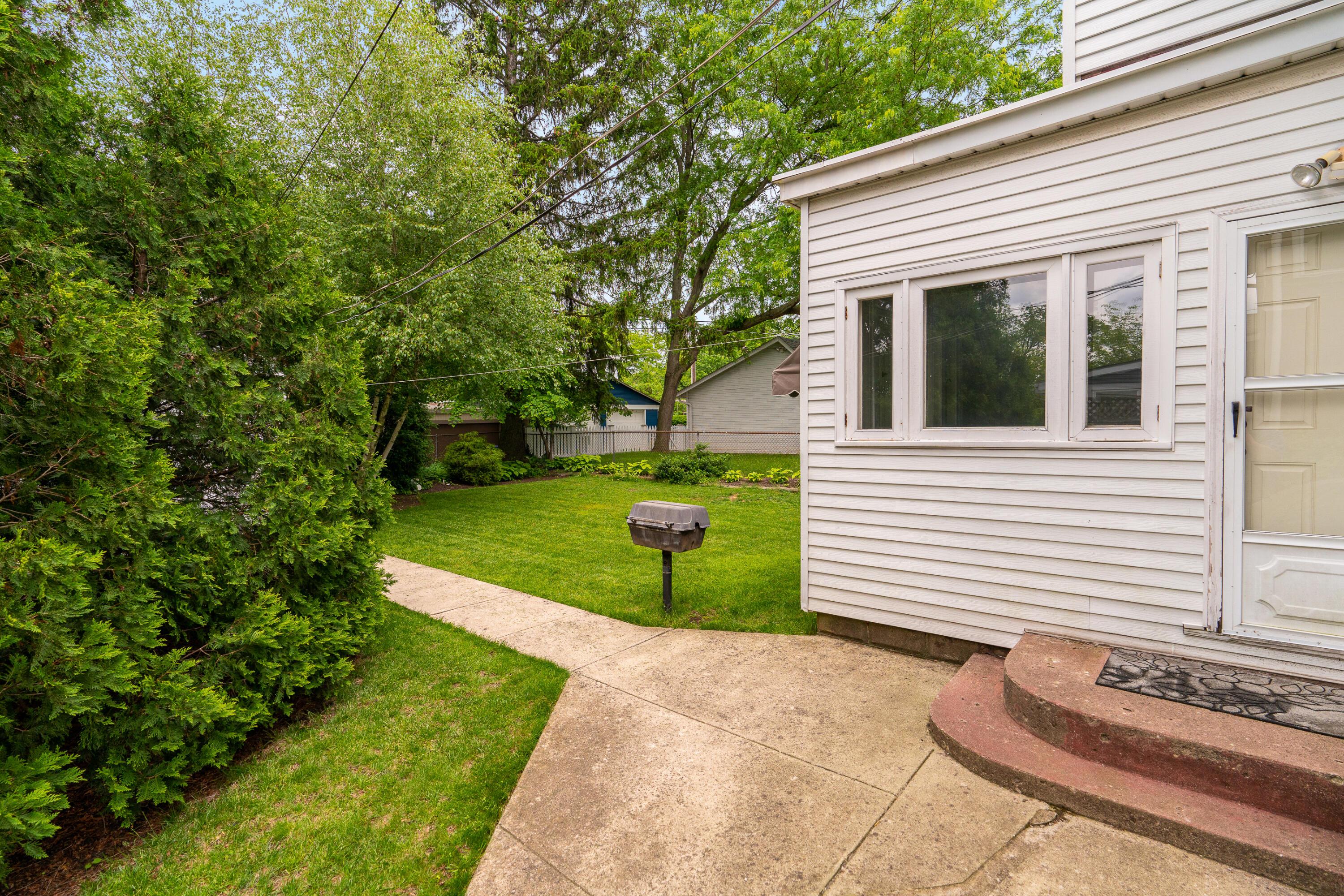 54 East Tulane Road Columbus, OH 43202 - Photo 28 of 36 Backdoor & patio #1 in fenced backyard.