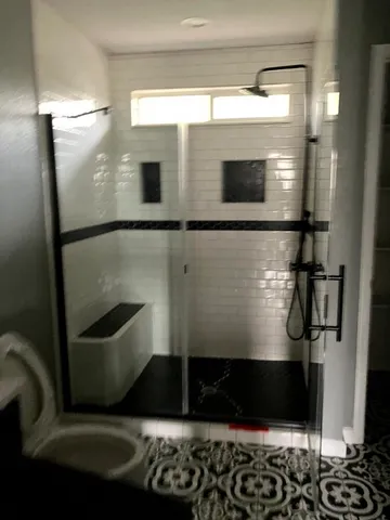 a bathroom with a mirror