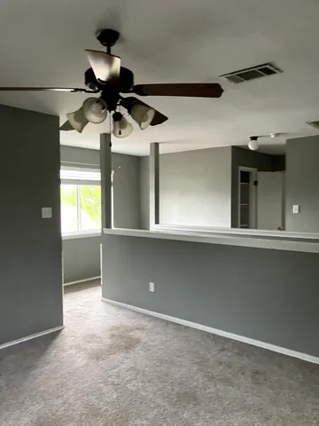 a view of a chandelier fan