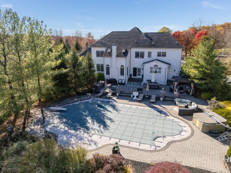 16 Perry Road Annandale, NJ 08801 - Photo 14 of 49 a view of a patio with couches chairs and potted plants
